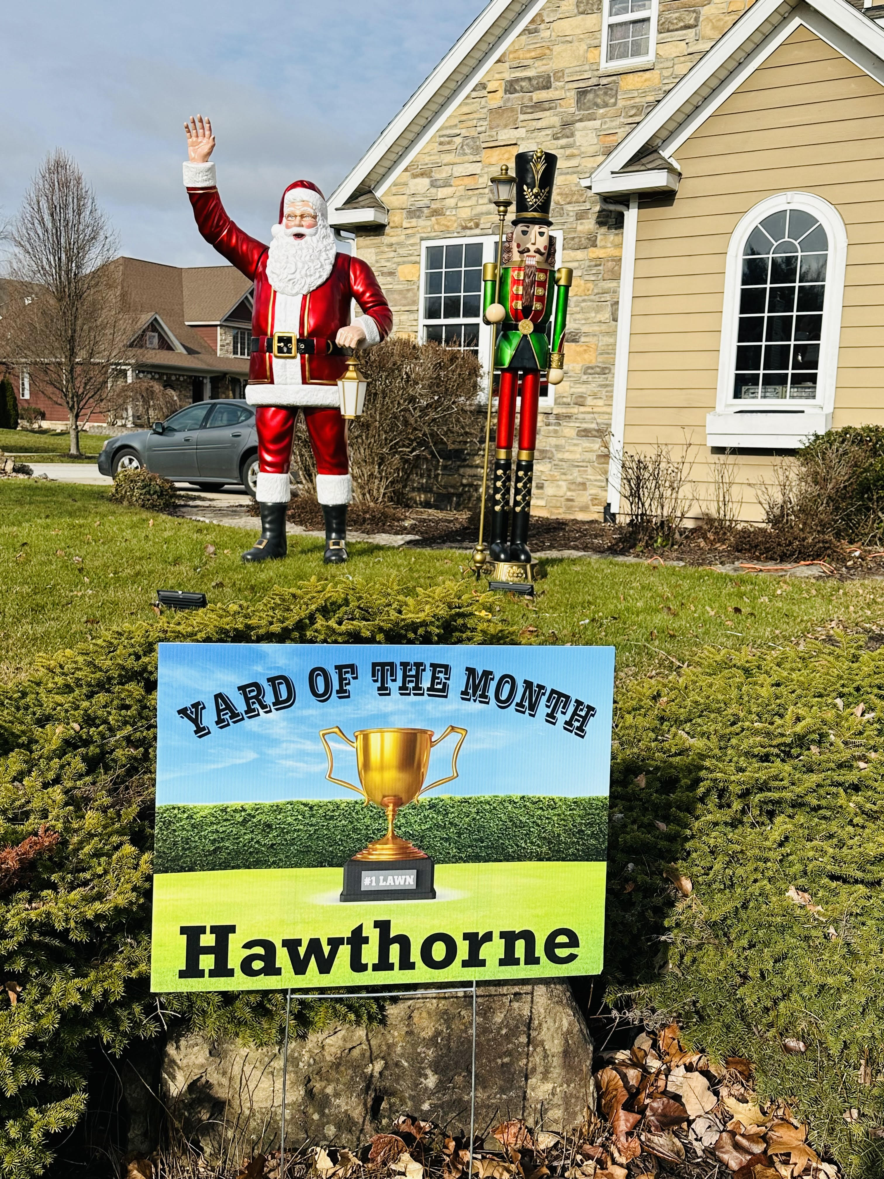 Photo of yard sign, Santa, and a nutcracker in front of a single family home at 4400 Blair Lane, Valparaiso, Indiana, 46383.