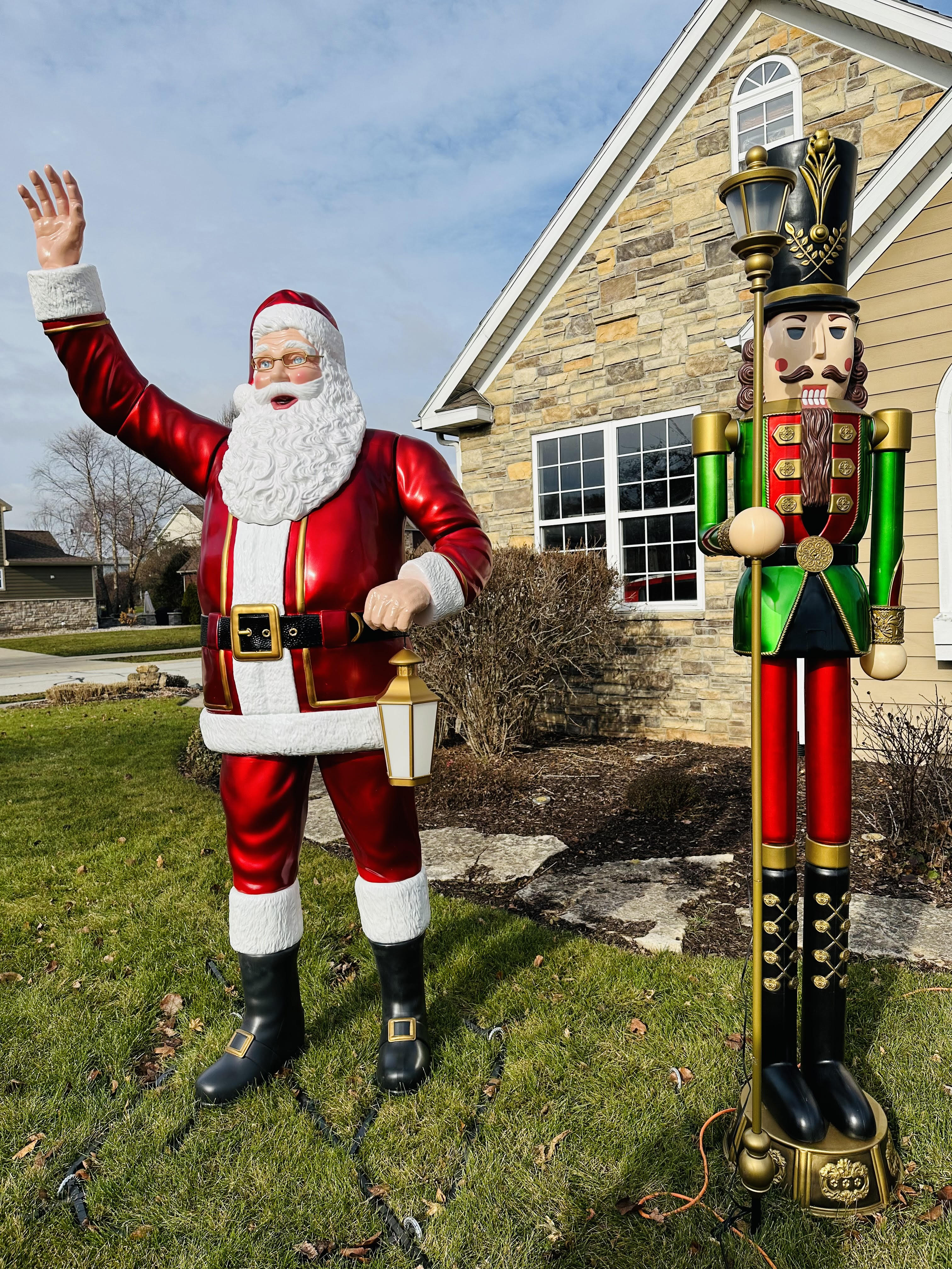 Photo of a lifesize Santa and nutcracker in front of a single family home at 4400 Blair Lane, Valparaiso, Indiana, 46383.