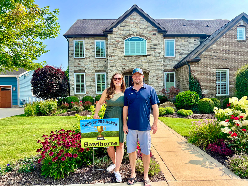 Photo of homeowners in front of single family home at 2506 Nottingham Drive, Valparaiso, Indiana, 46383.