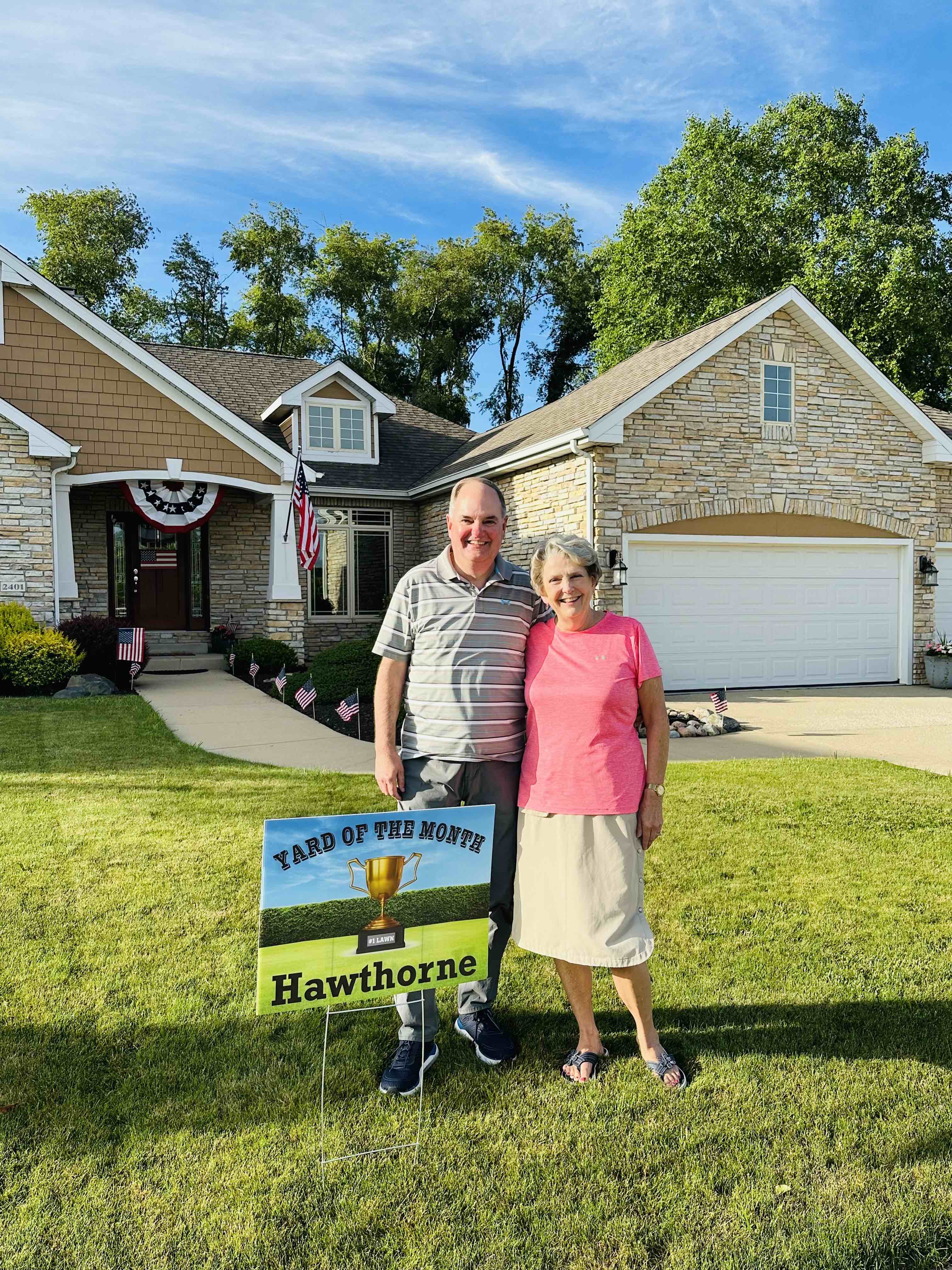 Photo of homeowners in front of a single family home at 2401 Pennington, Valparaiso, Indiana, 46383.